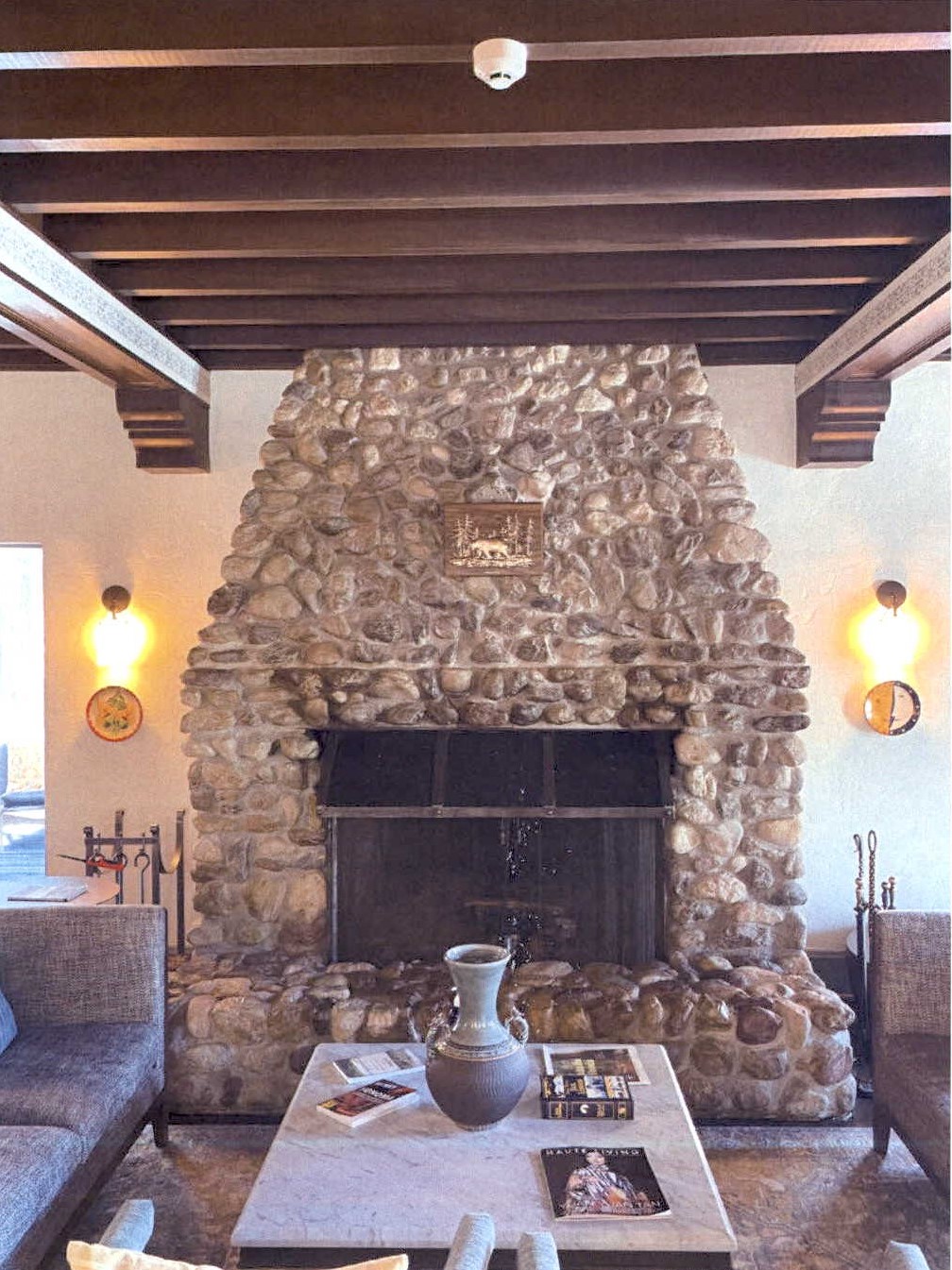 River rock in restored salon on mail level